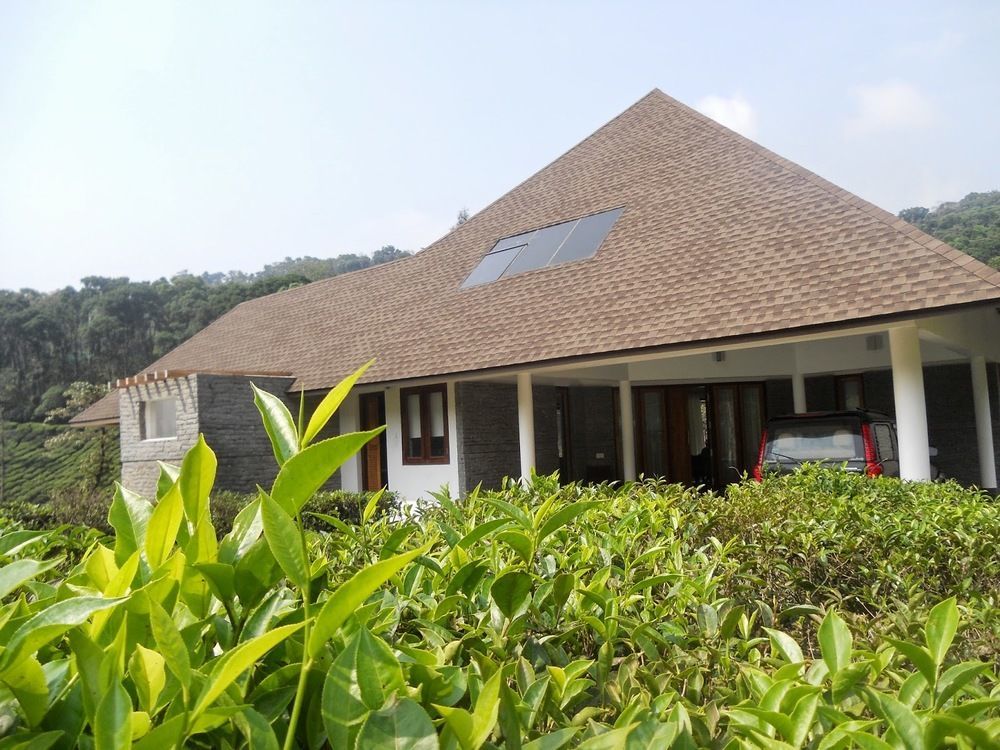 Hôtel Silver Oak Plantation Bungalow à Udumbanshola Extérieur photo
